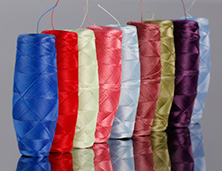 Polyester cocoon bobbins, close detail